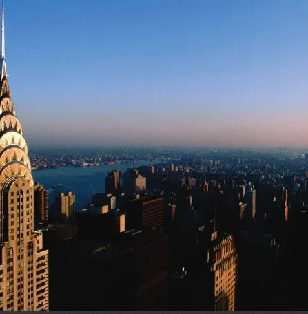 The Chrysler Building's spire above Midtown Manhattan at dusk